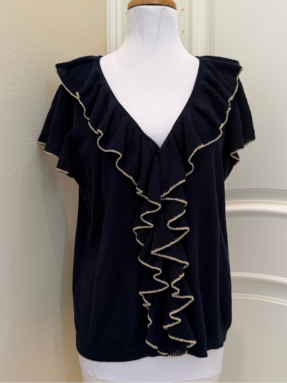 Chaps ruffled front sweater top
With button front and gold trim